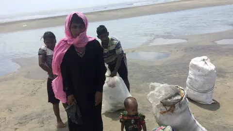 Una familia de refugiados rohinyás Una familia de refugiados rohinyás