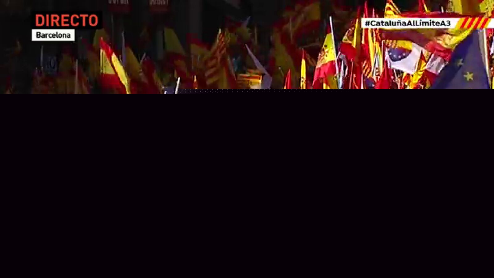 Banderas españolas, catalanas y europeas, juntas por la unidad de España en Barcelona