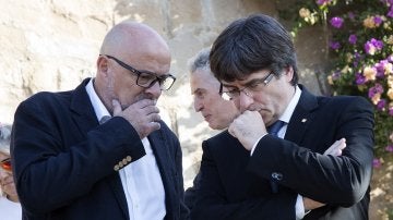 Lluís Corominas y Carles Puigdemont