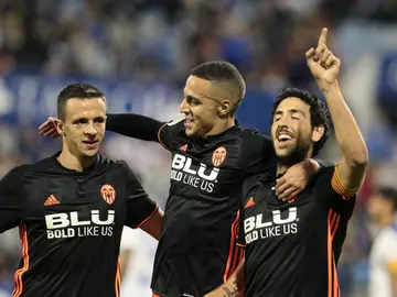Los jugadores del Valencia celebran un gol del equipo che Los jugadores del Valencia celebran un gol del equipo che