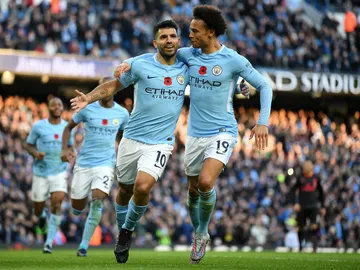 Agüero celebra un gol con Sane Agüero celebra un gol con Sane