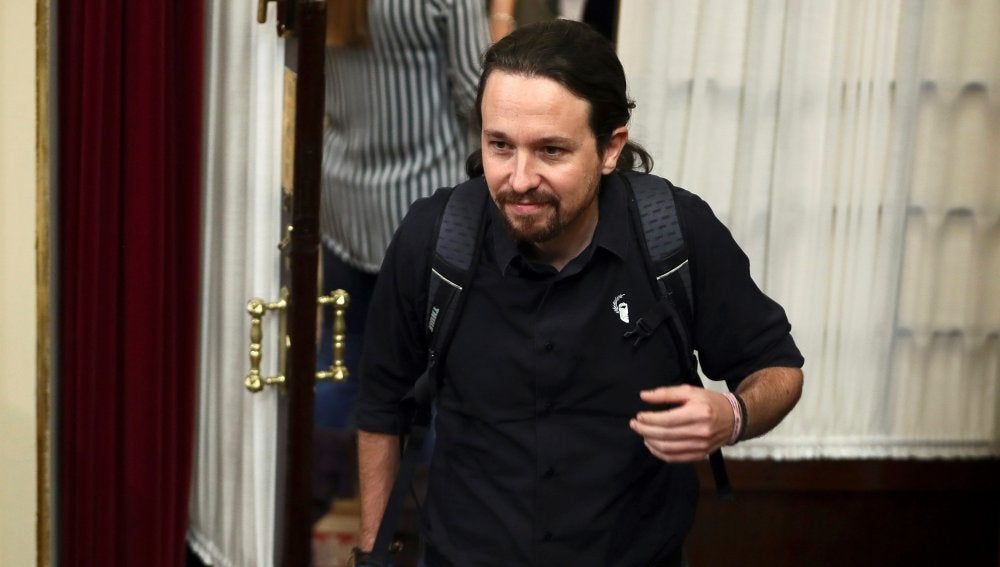 El líder de Podemos, Pablo Iglesias, a su llegada al pleno del Congreso