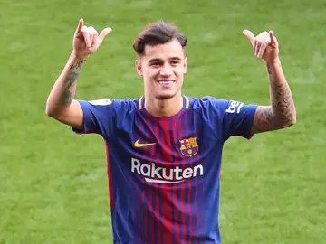 Philippe Coutinho posa sonriente en su presentación con el Barça Philippe Coutinho posa sonriente en su presentación con el Barça