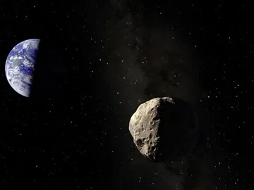 Imagen de archivo de un asteroide cerca de la Tierra Imagen de archivo de un asteroide cerca de la Tierra