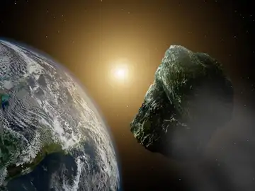 Recreación artística de un asteroide pasando por las cercanías de nuestro planeta Recreación artística de un asteroide pasando por las cercanías de nuestro planeta