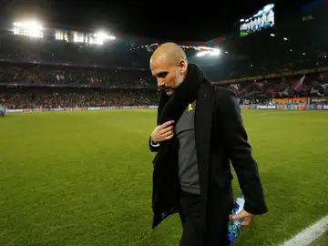 Guardiola, durante el partido contra el Basilea Guardiola, durante el partido contra el Basilea