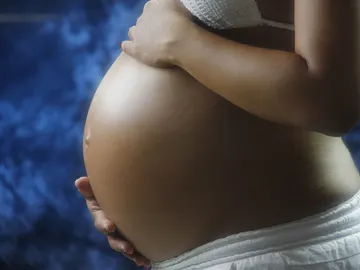 Foto de archivo de una mujer embarazada Foto de archivo de una mujer embarazada