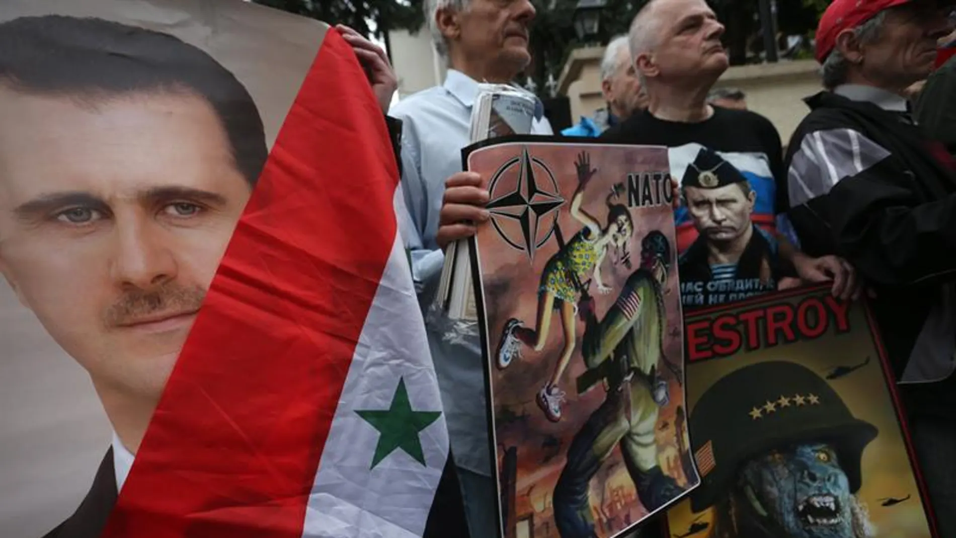 Afines a Al Asad protestan contra EEUU Afines a Al Asad protestan contra EEUU