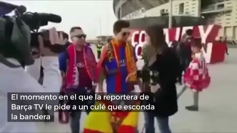 Una reportera de Barça TV pide a un aficionado culé que esconda la bandera de España para entrevistarle Una reportera de Barça TV pide a un aficionado culé que esconda la bandera de España para entrevistarle