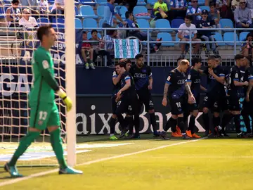 Los jugadores del Alavés celebran uno de los goles contra el Málaga Los jugadores del Alavés celebran uno de los goles contra el Málaga