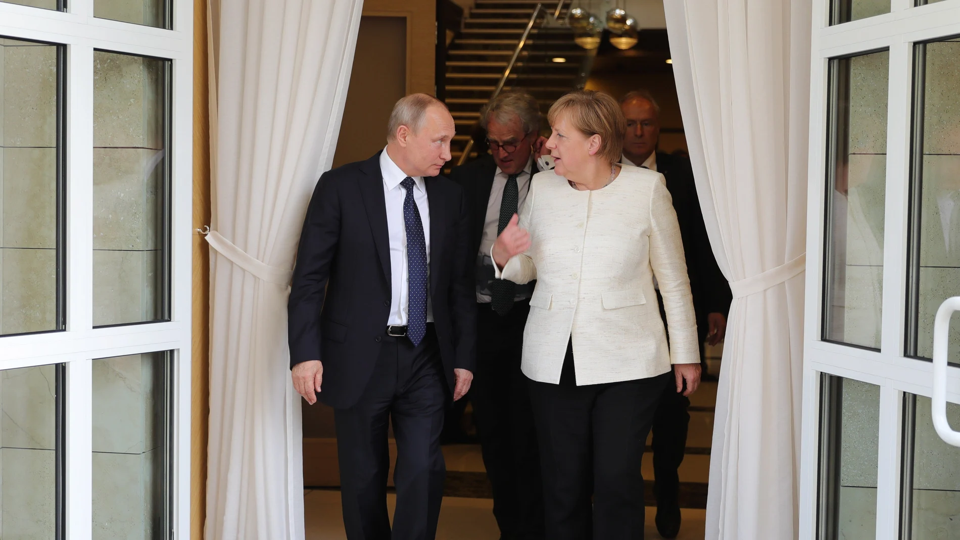 Merkel y Putin Merkel y Putin