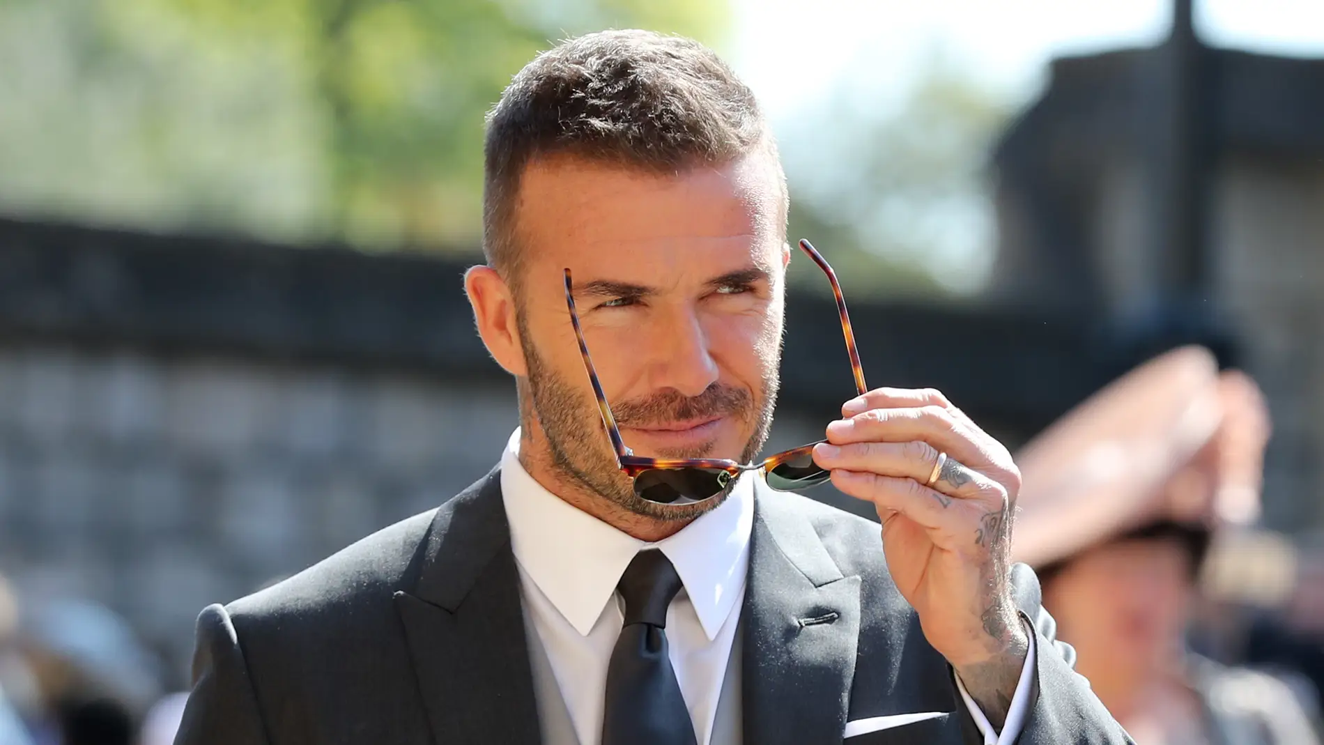 David Beckham nos conquista con su mirada arrebatadora en la boda de Meghan Markle y el príncipe Harry