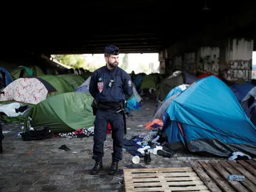 Evacuación de un campamento de inmigrantes en París Evacuación de un campamento de inmigrantes en París