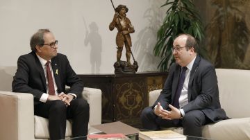 El presidente de la Generalitat, Quim Torra, y el líder del PSC, Miquel Iceta