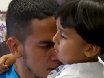 Una padre con su hijo Una padre con su hijo
