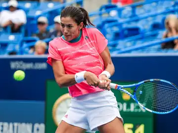 Garbiñe Muguruza golpea una bola Garbiñe Muguruza golpea una bola
