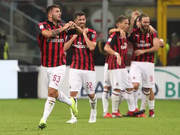 Jugadores del Milan celebrando un gol Jugadores del Milan celebrando un gol