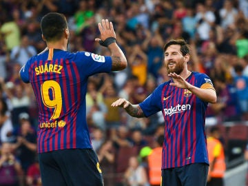Messi y Suárez celebran un gol