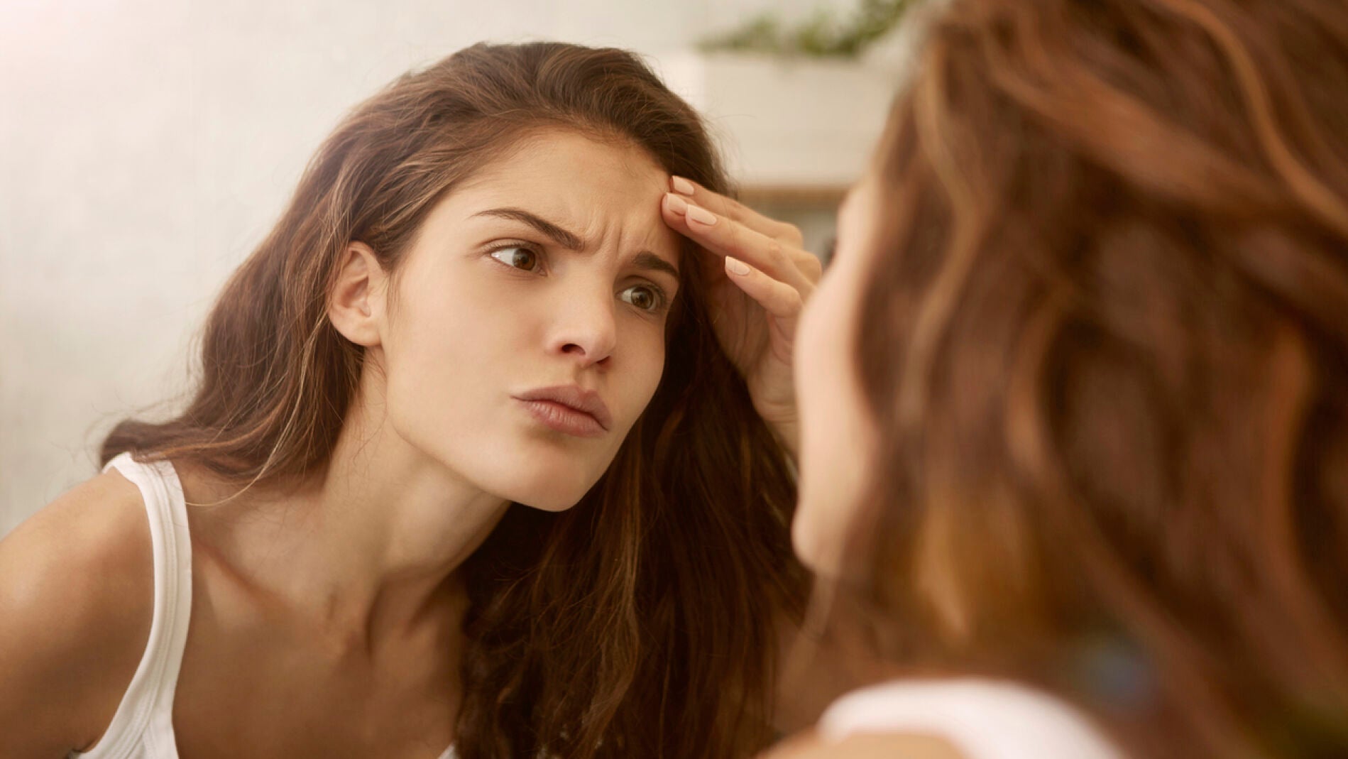 Mujer con manchas en la cara