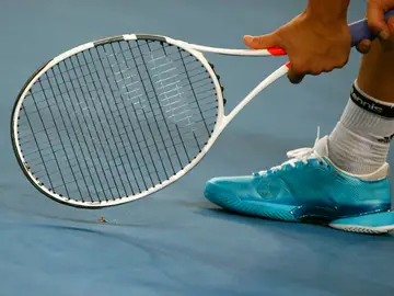 Momento de un partido de tenis Momento de un partido de tenis
