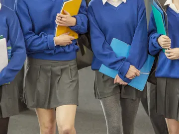 Estudiantes de un colegio privado con su uniforme escolar Estudiantes de un colegio privado con su uniforme escolar