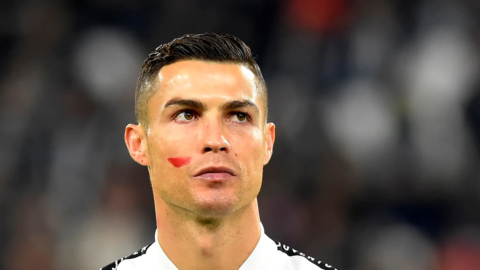 Cristiano Ronaldo, con la cara pintada de rojo