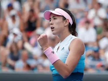 Garbiñe Muguruza celebra un punto en su estreno en el Open de Australia Garbiñe Muguruza celebra un punto en su estreno en el Open de Australia