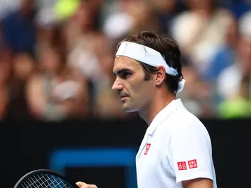 Roger Federer celebrando la victoria en un partido del Open de Australia Roger Federer celebrando la victoria en un partido del Open de Australia