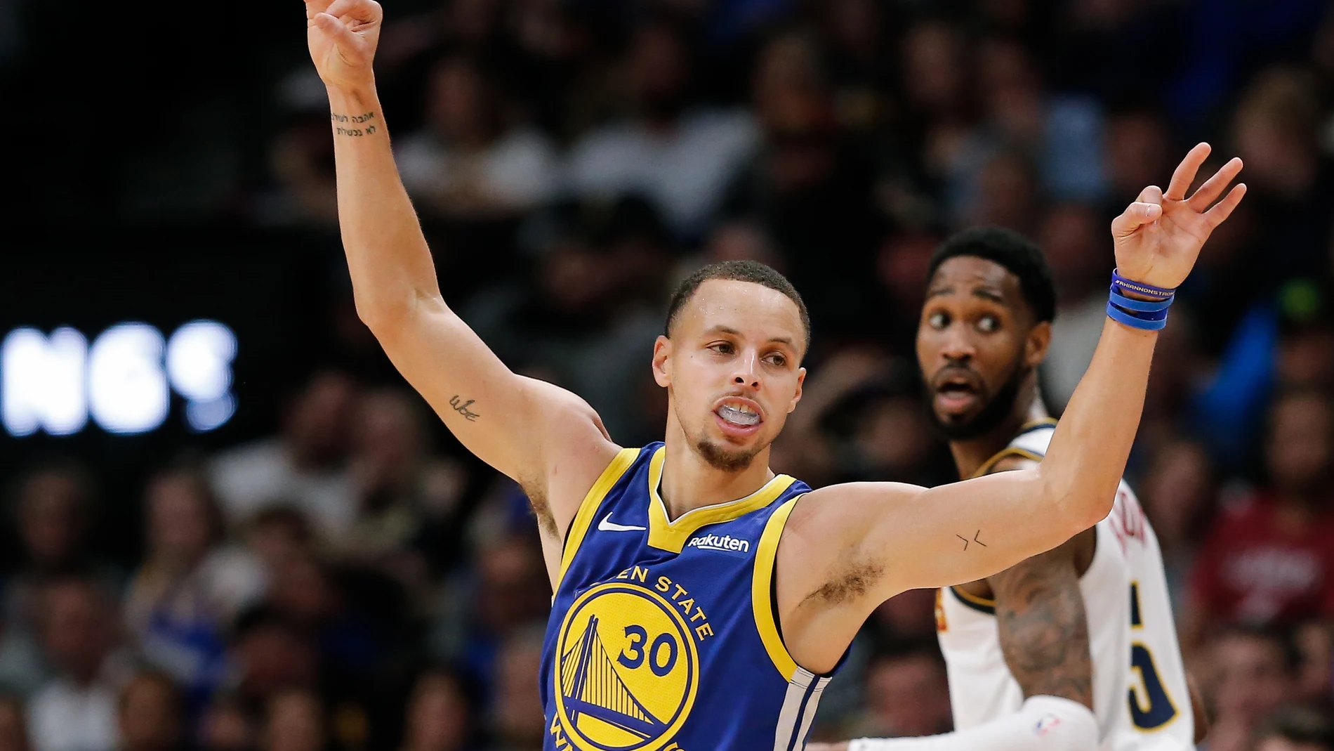 Stephen Curry celebra una canasta ante los Nuggets Stephen Curry celebra una canasta ante los Nuggets