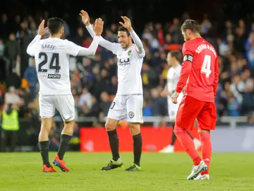 Garay y Parejo celebran un gol ante Ramos Garay y Parejo celebran un gol ante Ramos