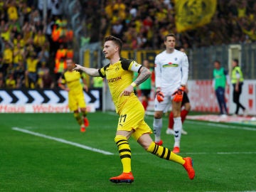 Marco Reus celebra un gol ante el Friburgo