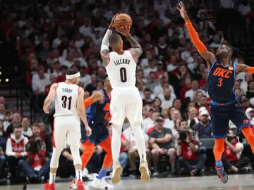 El triplazo de Damian Lillard El triplazo de Damian Lillard