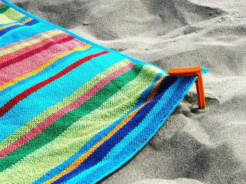 Pinza de toalla para playa