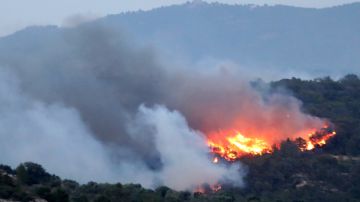 Vista del incendio que se ha declarado en la comarca tarraconense de Ribera d'Ebre Vista del incendio que se ha declarado en la comarca tarraconense de Ribera d'Ebre