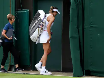 Muguruza dice adiós a Wimbledon en primera ronda Muguruza dice adiós a Wimbledon en primera ronda