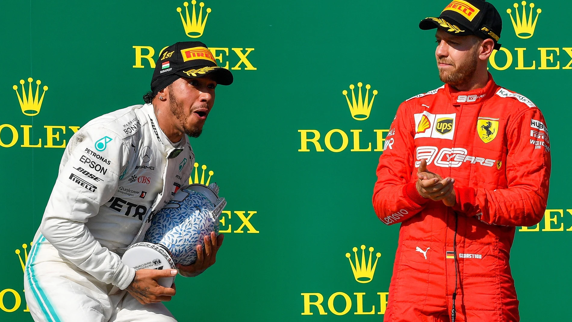 Lewis Hamilton en el podio junto a Sebastian Vettel en el GP de Hungría Lewis Hamilton en el podio junto a Sebastian Vettel en el GP de Hungría