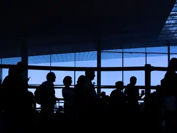 Pasajeros en el Aeropuerto de El Prat Pasajeros en el Aeropuerto de El Prat