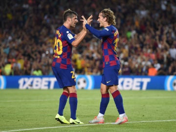 Antoine Griezmann y Sergi Roberto celebran el gol del francés