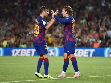 Antoine Griezmann y Sergi Roberto celebran el gol del francés Antoine Griezmann y Sergi Roberto celebran el gol del francés
