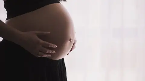 Foto de archivo de una mujer embarazada Foto de archivo de una mujer embarazada