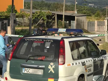 Vista de la zona precintada por el triple crimen cometido Vista de la zona precintada por el triple crimen cometido