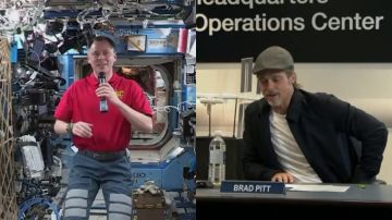 El astronauta junto a Brad Pitt El astronauta junto a Brad Pitt