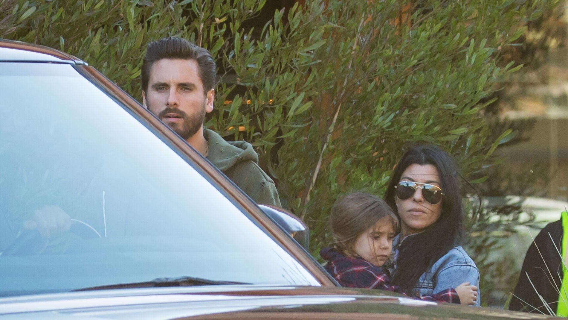 Kourtney Kardashian y Scott Disick con su hija Penelope