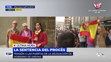 Increpados por llevar una bandera de España en Girona: 