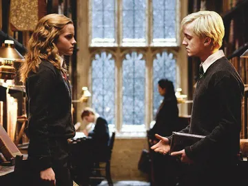 Hermione (Emma Watson) y Draco (Tom Felton) en la saga 'Harry Potter' Hermione (Emma Watson) y Draco (Tom Felton) en la saga 'Harry Potter'