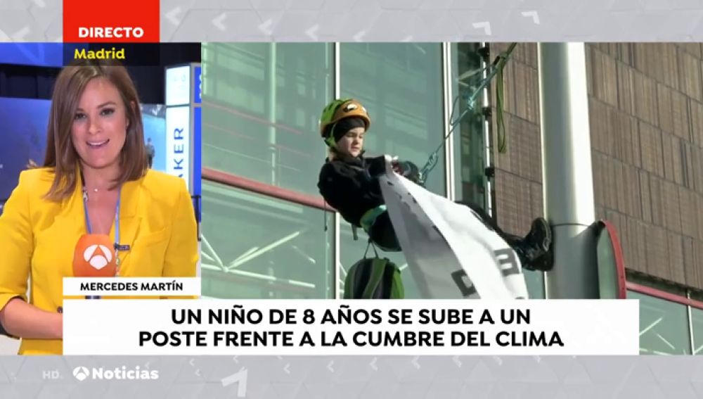 Inspirados por Greta Thumberg: Un niño alemán de 8 años escala a una farola en Madrid para luchar contra la crisis climática