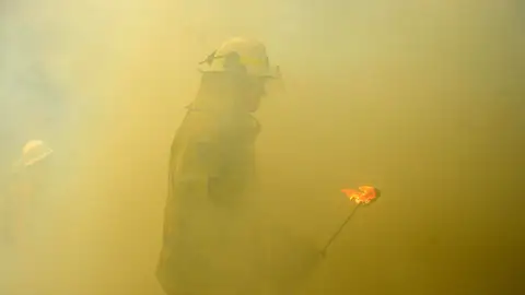 Un bombero en Australia Un bombero en Australia