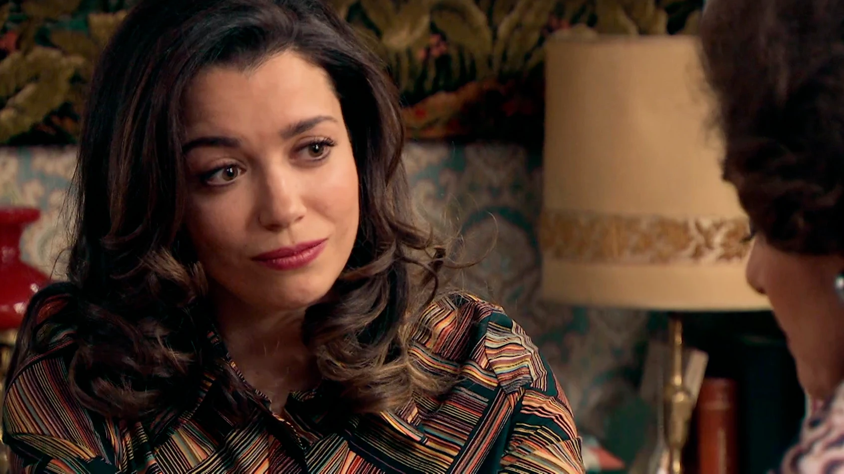 Amelia conversa con Benigna