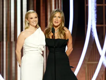 Reese Witherspoon y Jennifer Aniston en los Globos de Oro Reese Witherspoon y Jennifer Aniston en los Globos de Oro