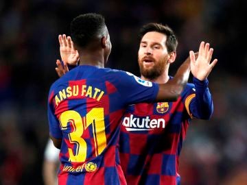 Ansu Fati y Leo Messi
